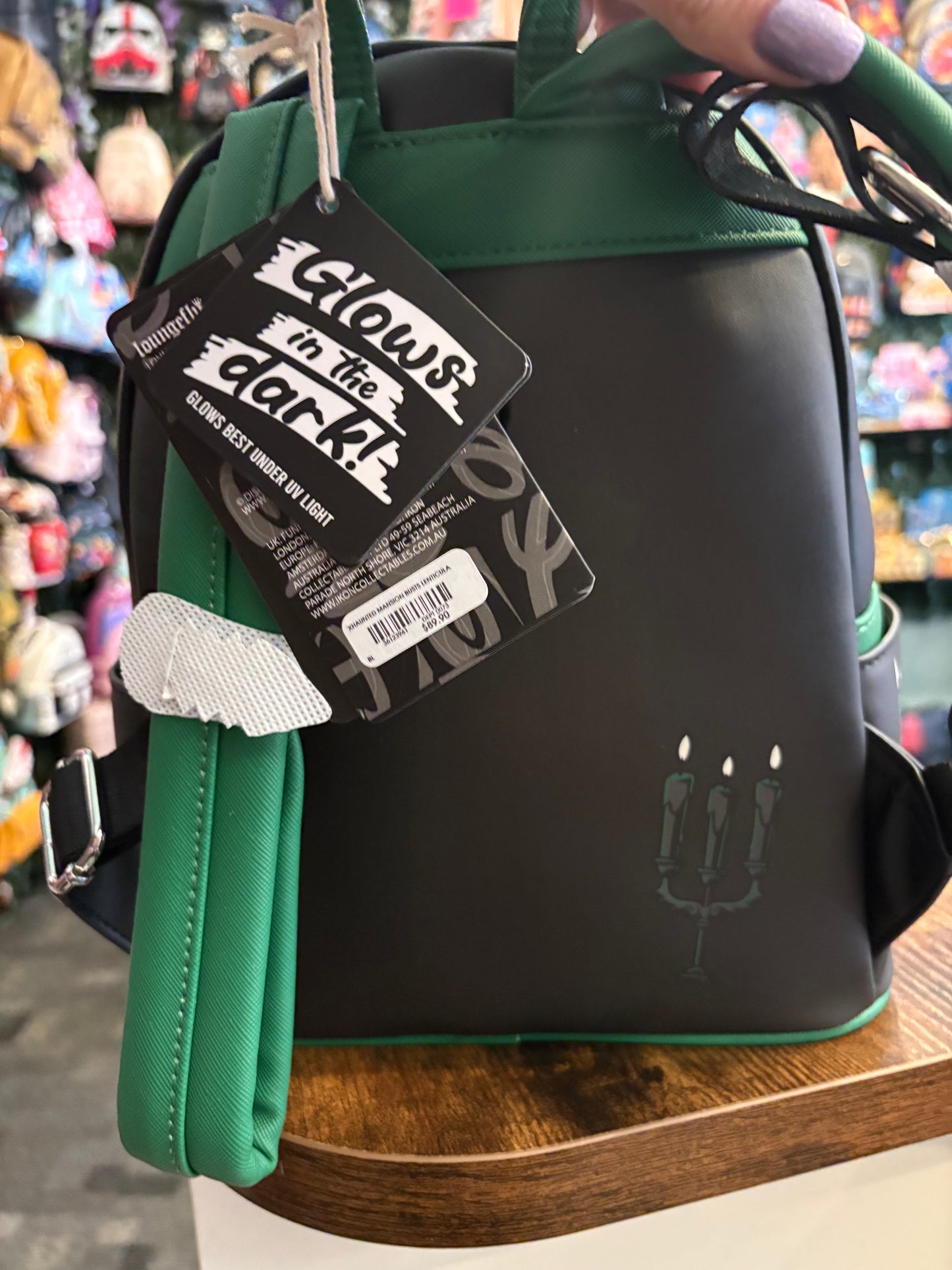 Loungefly Haunted Mansion Busts mini Backpack Glows in the Dark