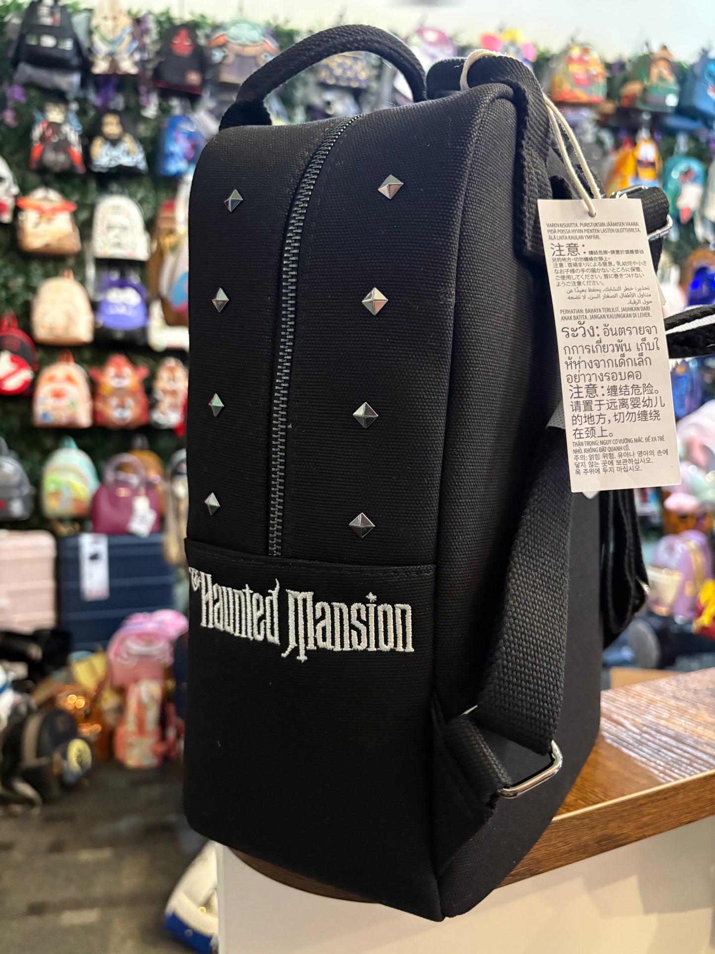 Loungefly Disney Parks Haunted Mansion Canvas Black mini backpack embroidered and studded