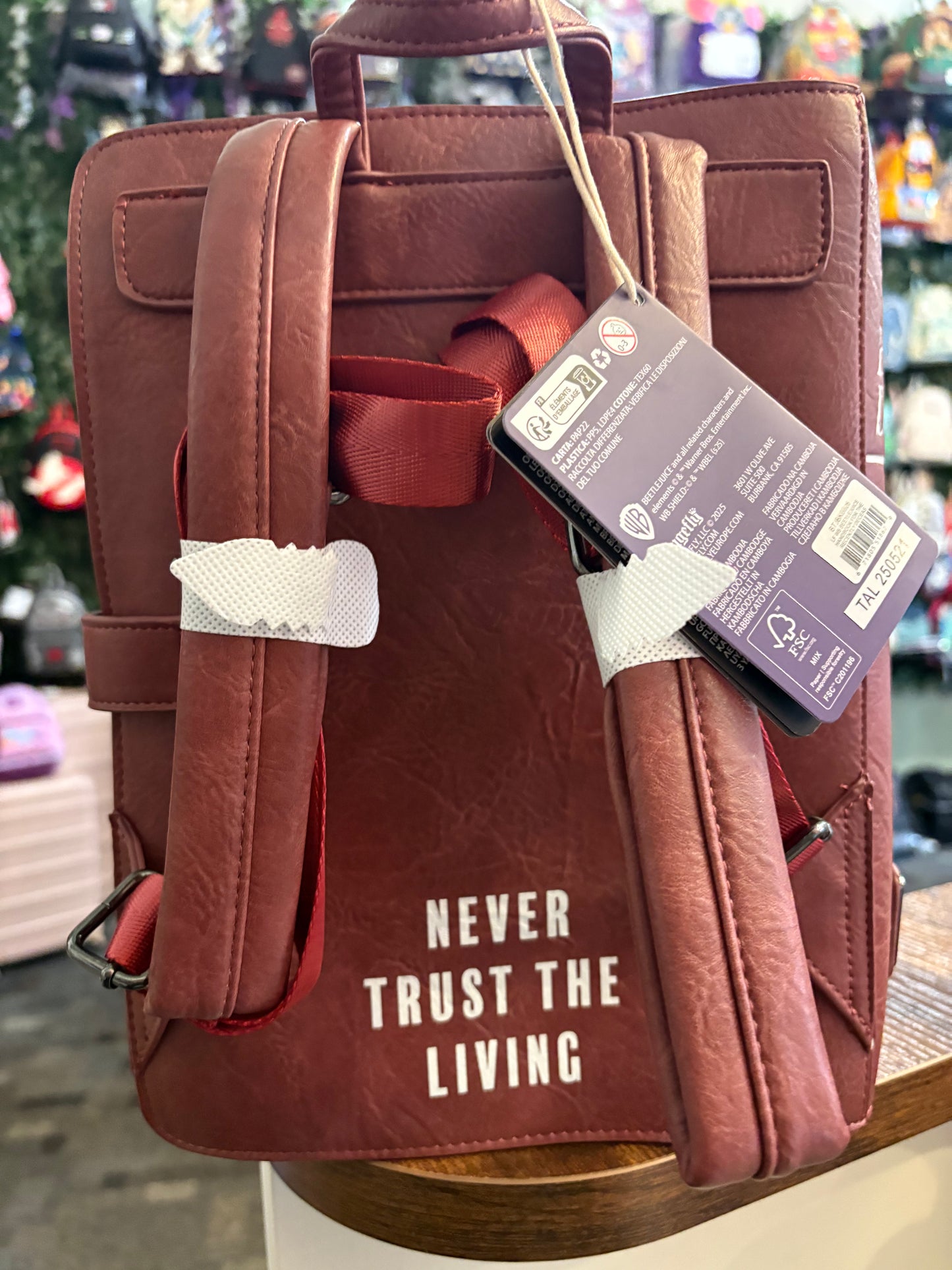 Loungefly Beetlejuice handbook foe the recently deceased mini backpack
