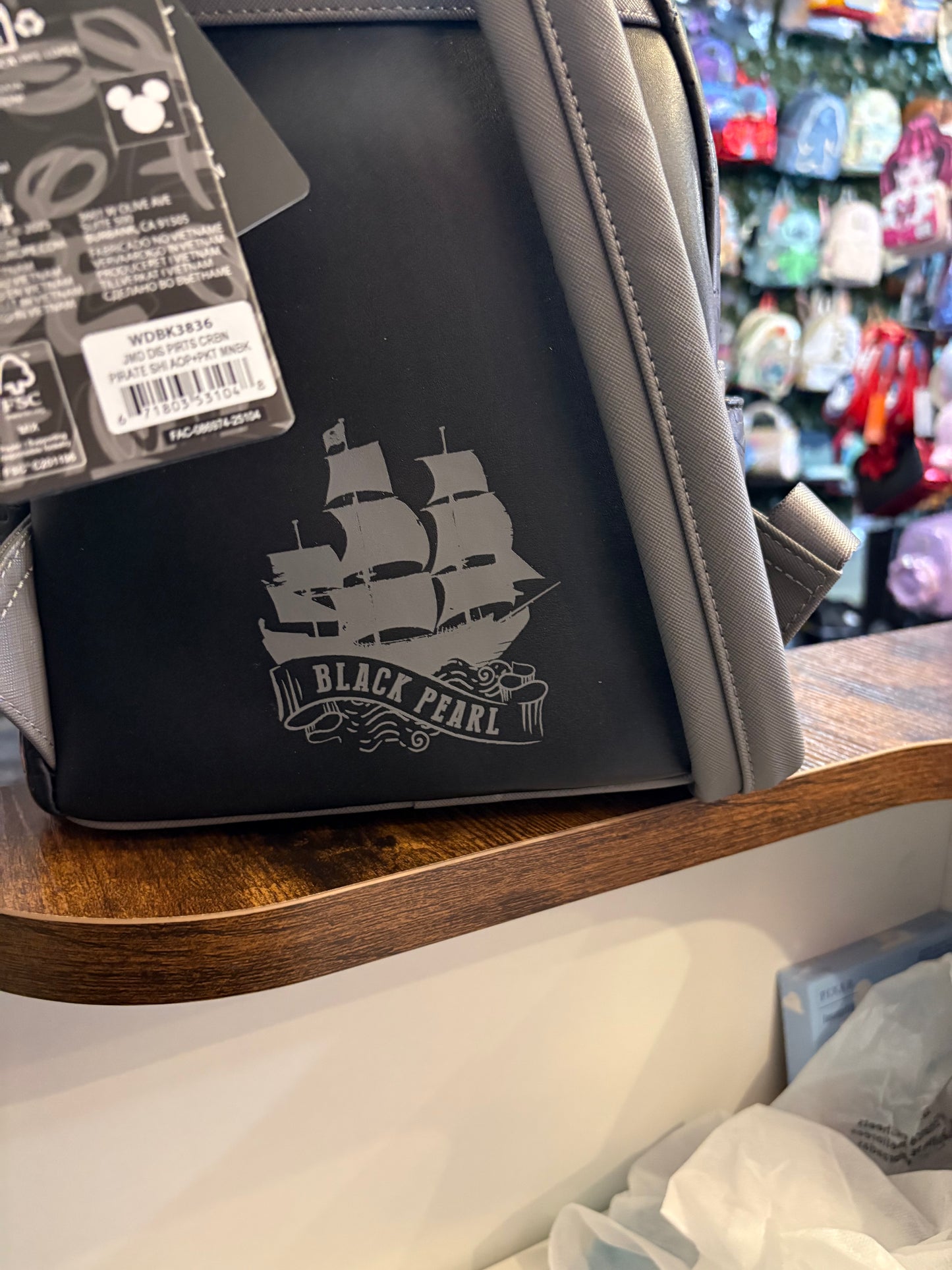 Loungefly Disney Pirates of the Caribbean pirate ship mini backpack glows in the dark