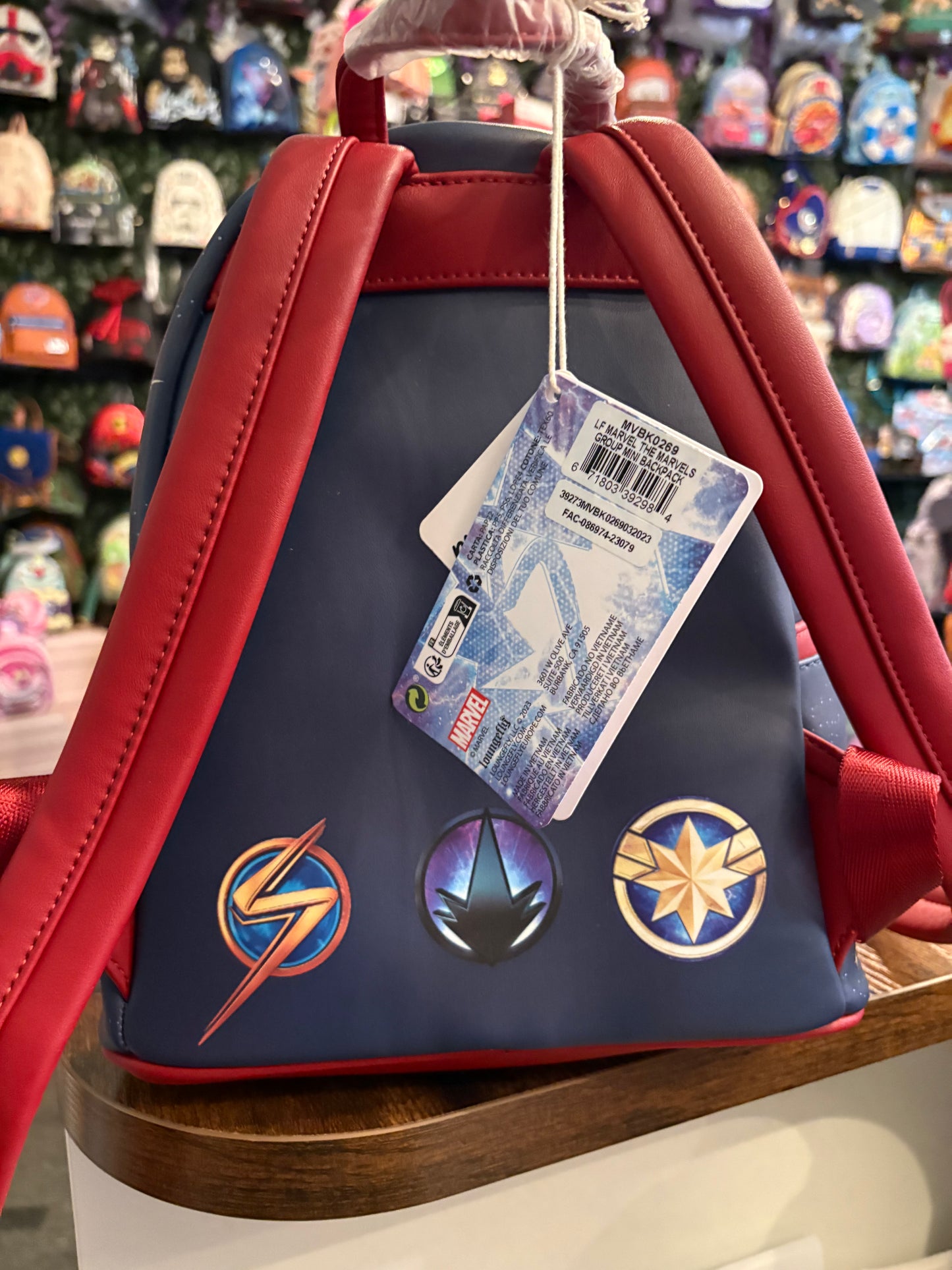 Loungefly Marvel The Marvels Group features Captain Marvel, Photon, and Mrs Marvel Mini Backpack