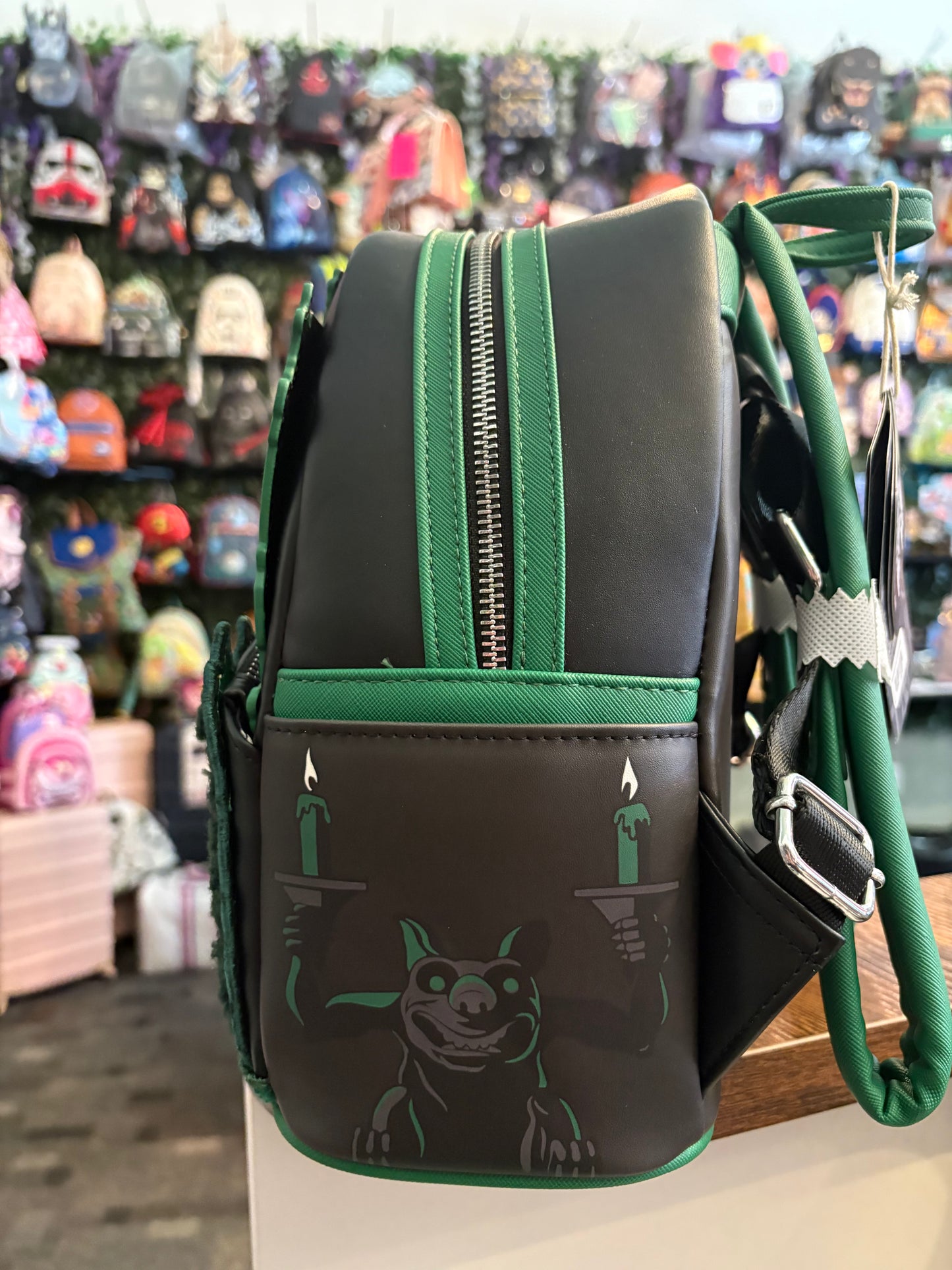 Loungefly Haunted Mansion Busts mini Backpack Glows in the Dark