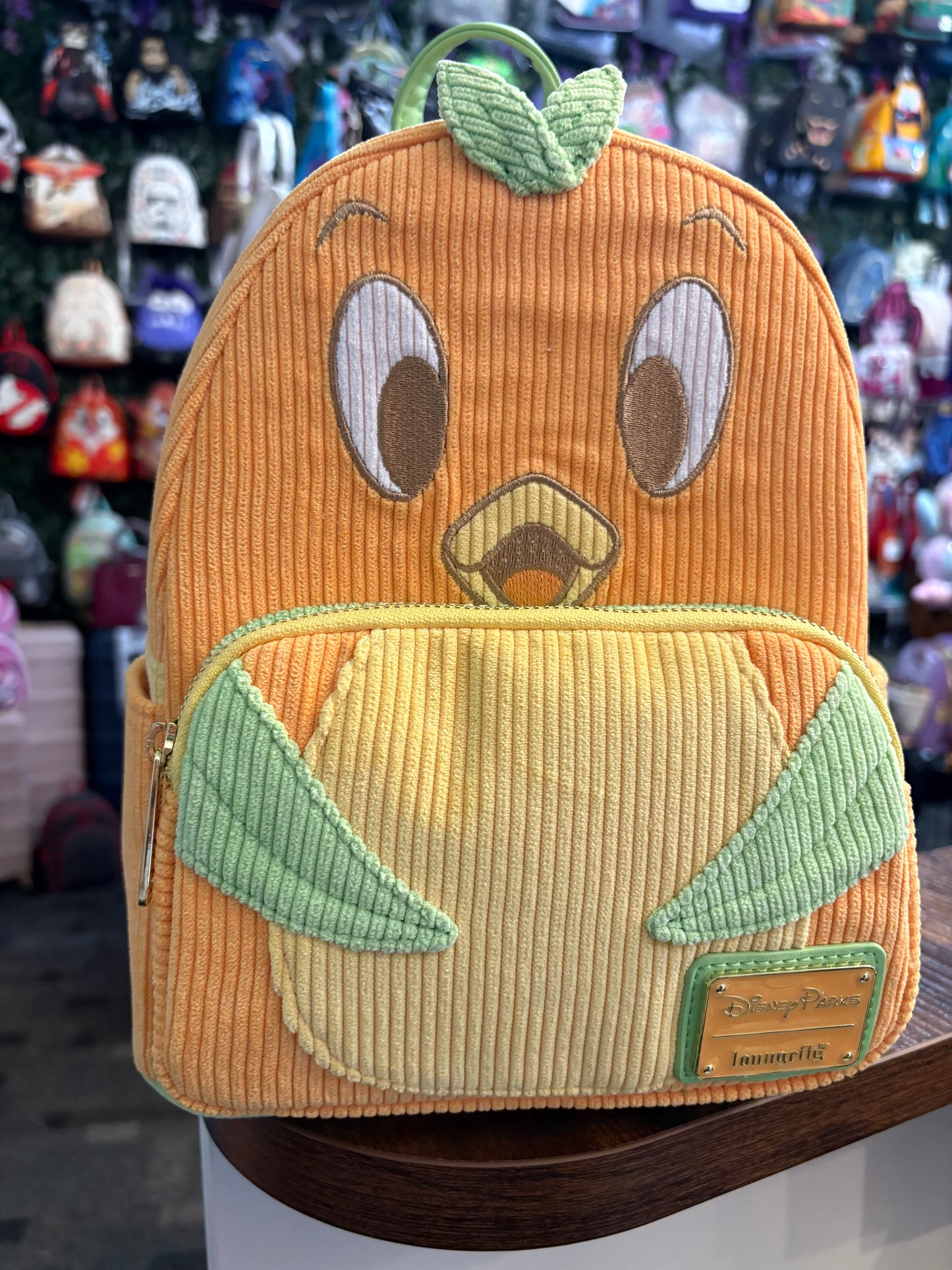 Loungefly Disney Parks Epcot Orange Bird Corduroy mini backpack
