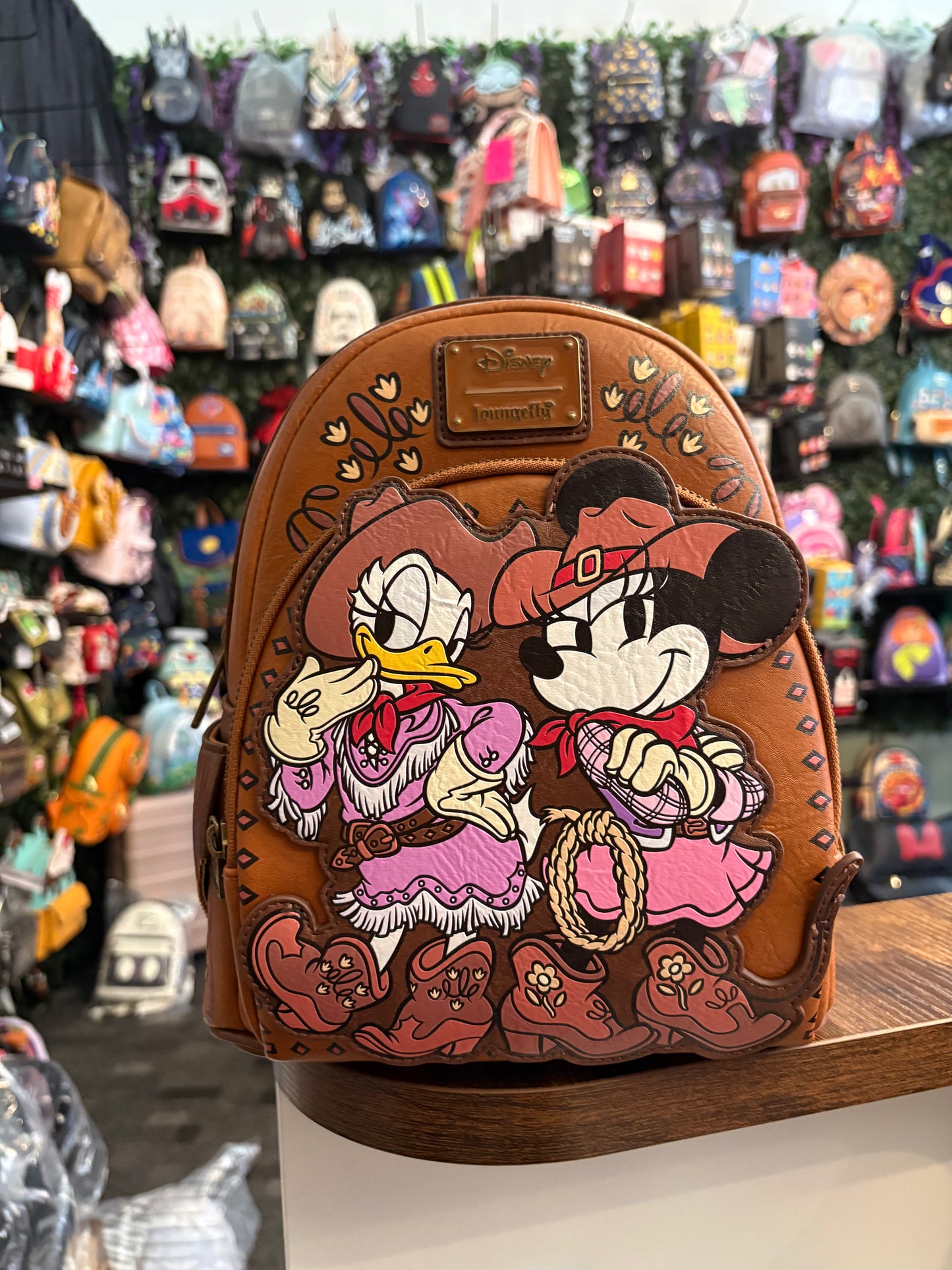 Loungefly Disney Minnie and Daisy Cowgirls mini backpack