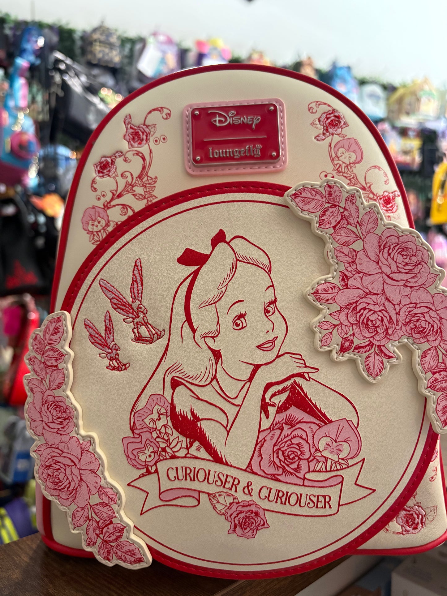 Loungefly Pink and Red Alice Sketch scene mini backpack