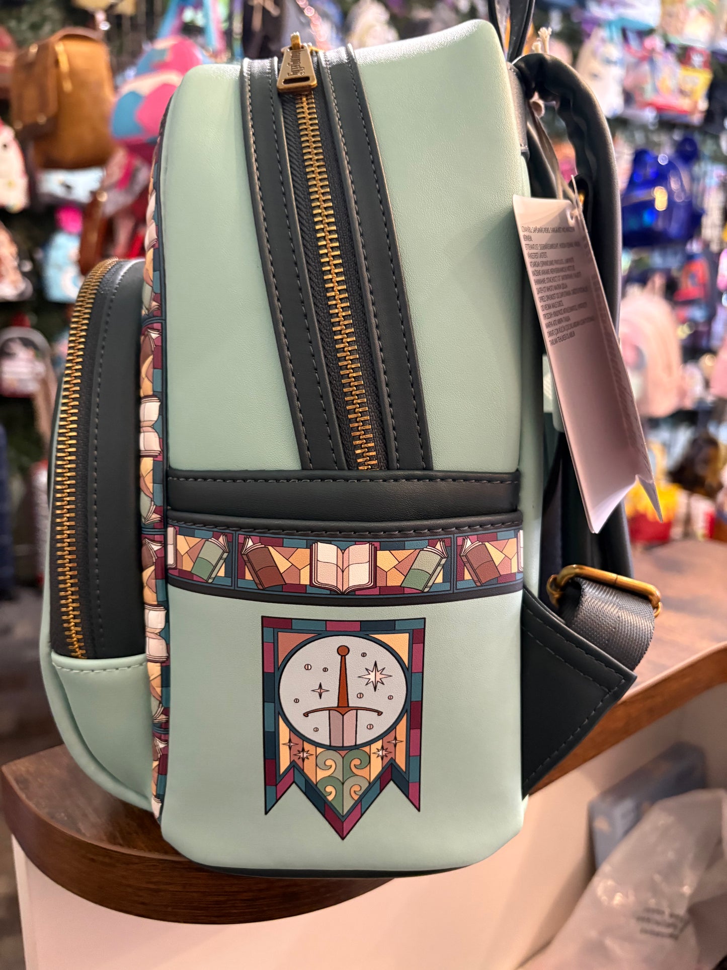 Loungefly Sword and Stone Stained Glass mini backpack