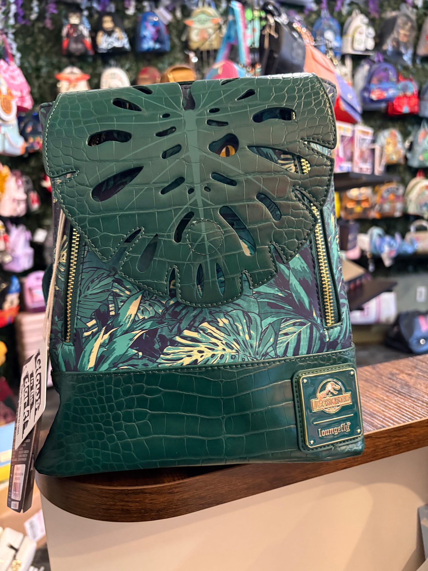 Loungefly Universal Jurassic Park mini backpack glows in the dark