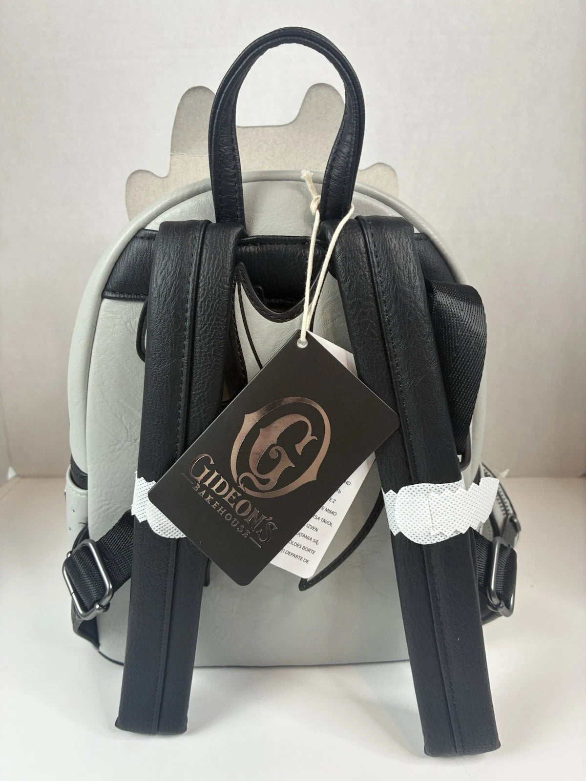 Loungefly Gideon’s Bakehouse Gray Gargoyle Mini Backpack - Glow-in-the-Dark